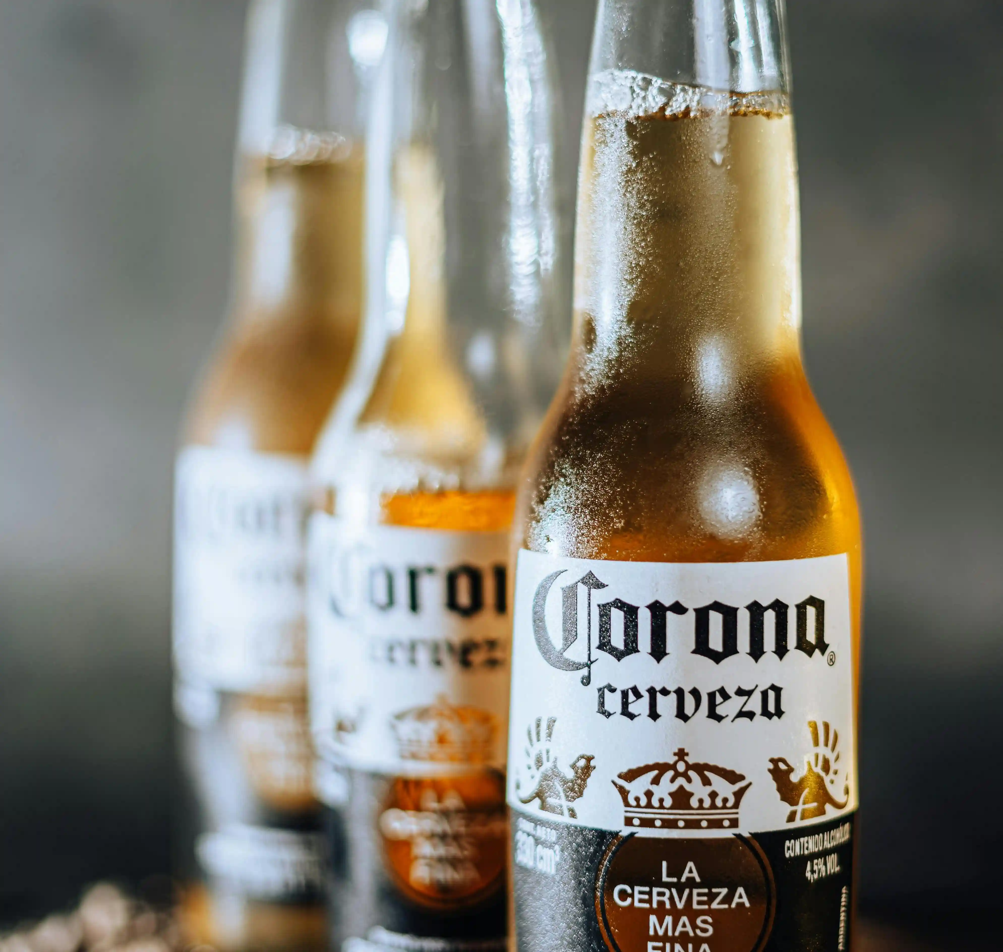 Chilled imported beer bottles from the cooler at ABLO Liquor Calgary
