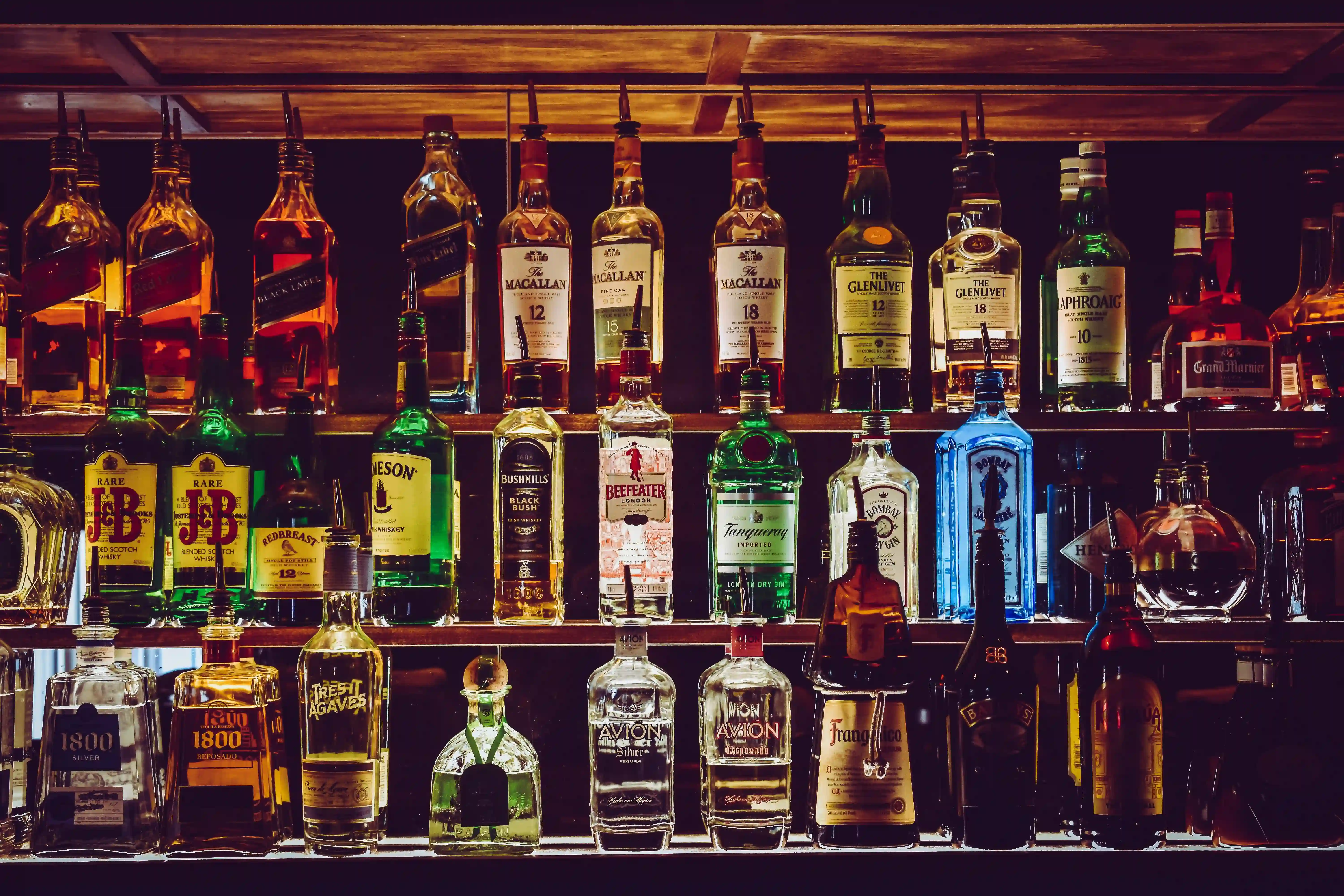 Whisky, gin and tequila bottles on the shelf at ABLO Liquor Legacy in southeast Calgary